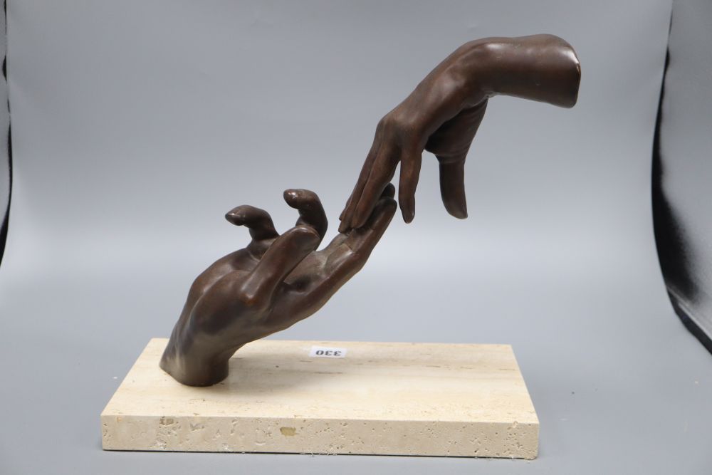 A modern American limited edition bronzed hand sculpture on a hardstone base, signed Lorenzo